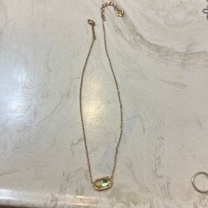 Kendra Scott rose gold necklace with iridescent pendant